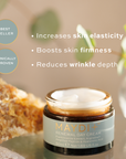 Maydi+ Renewal Day Cream jar with natural elements in the background. Increases elasticity, skin firmness and reduces wrinkle depth.