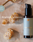 Maydi+ brightening daily serum bottle with ingredients on a neutral background. brightens dark spots, lifts and firms skin, improves skin clarity.