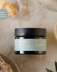 Maydl+ hydrating treatment mask jar on a natural stone background