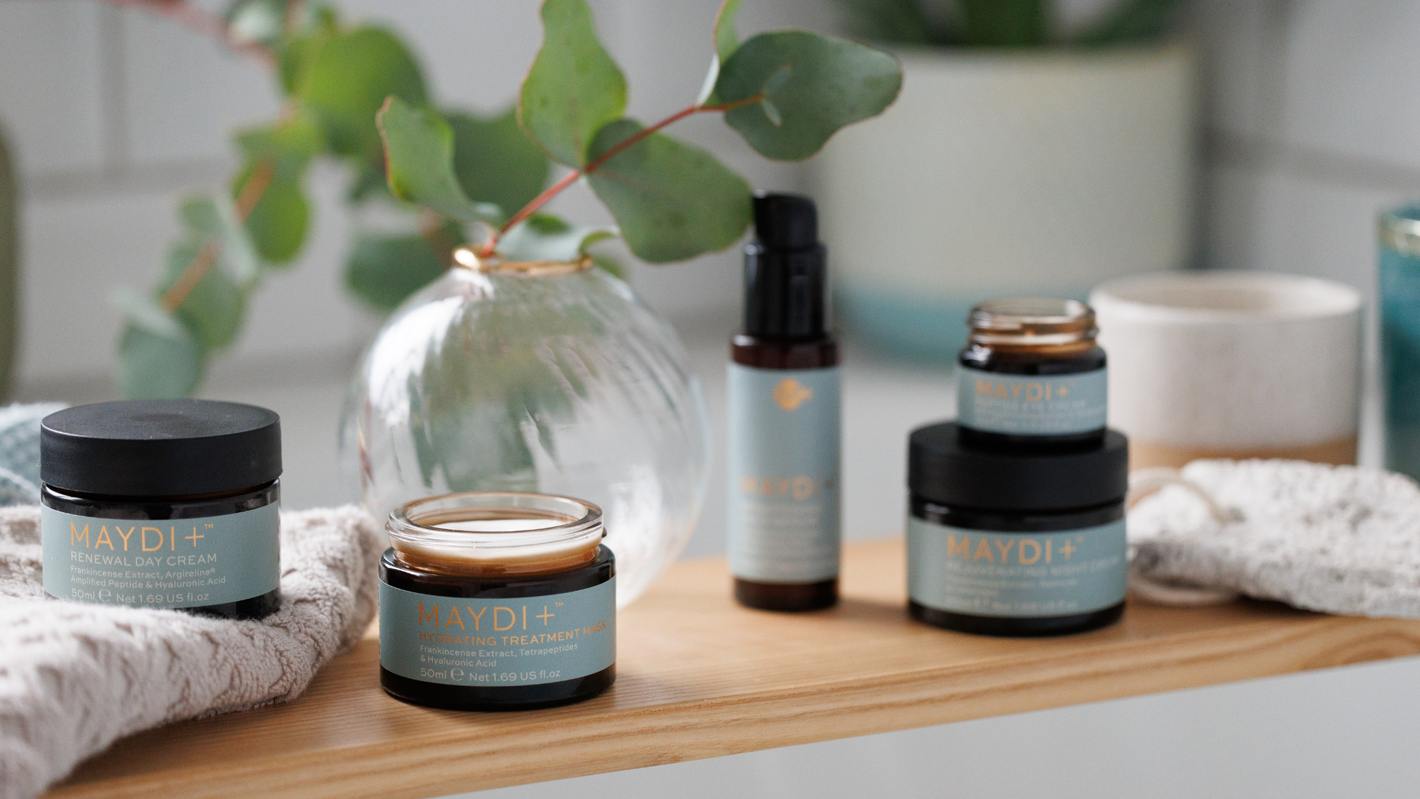 MAYDI+ Skincare range in bathroom